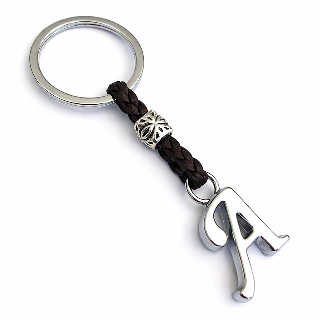 Portachiavi in cuoio e argento personalizzabile con iniziali, accessorio elegante per mazzo di chiavi.